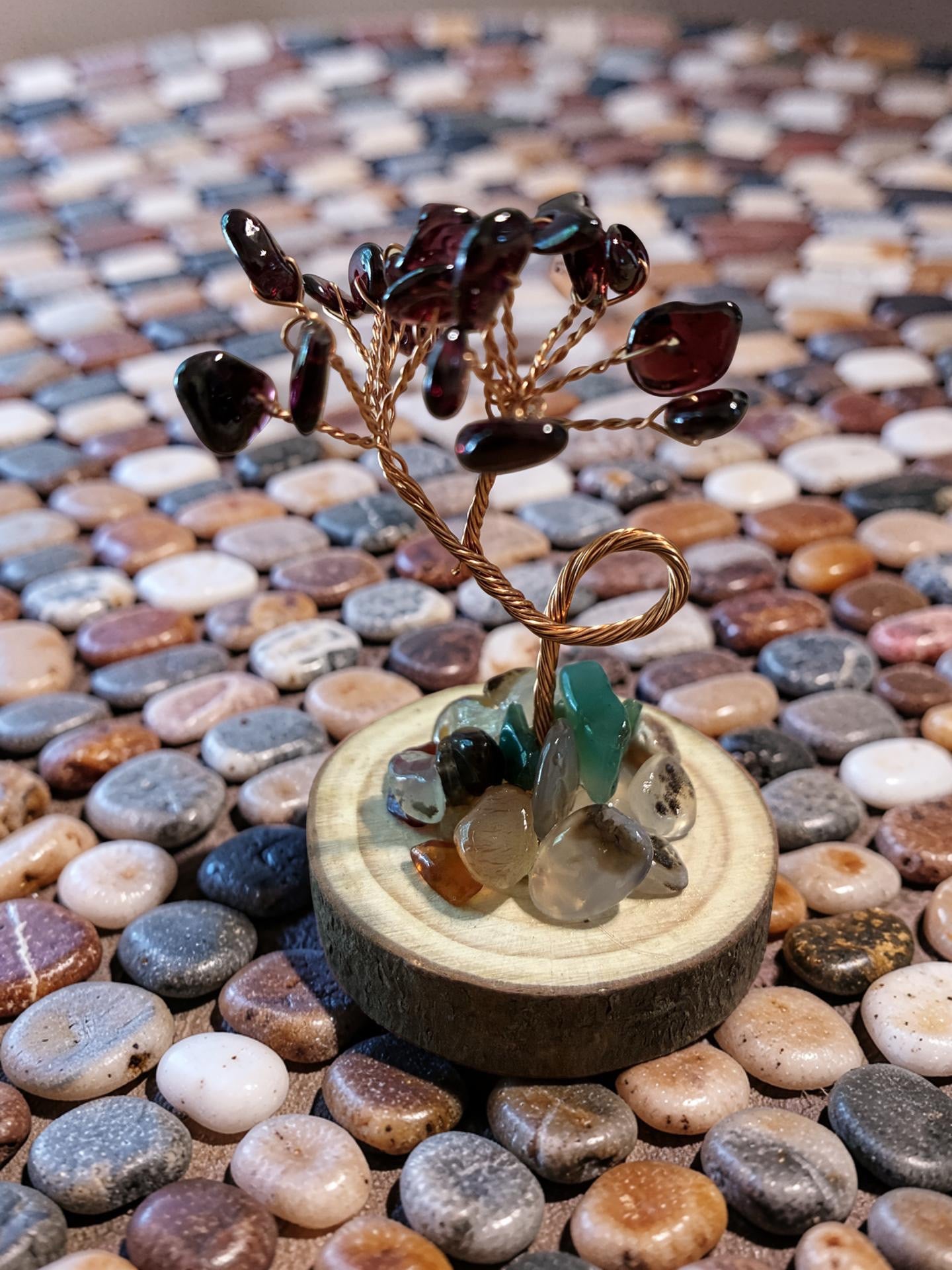 Garnet tree of life sculpture