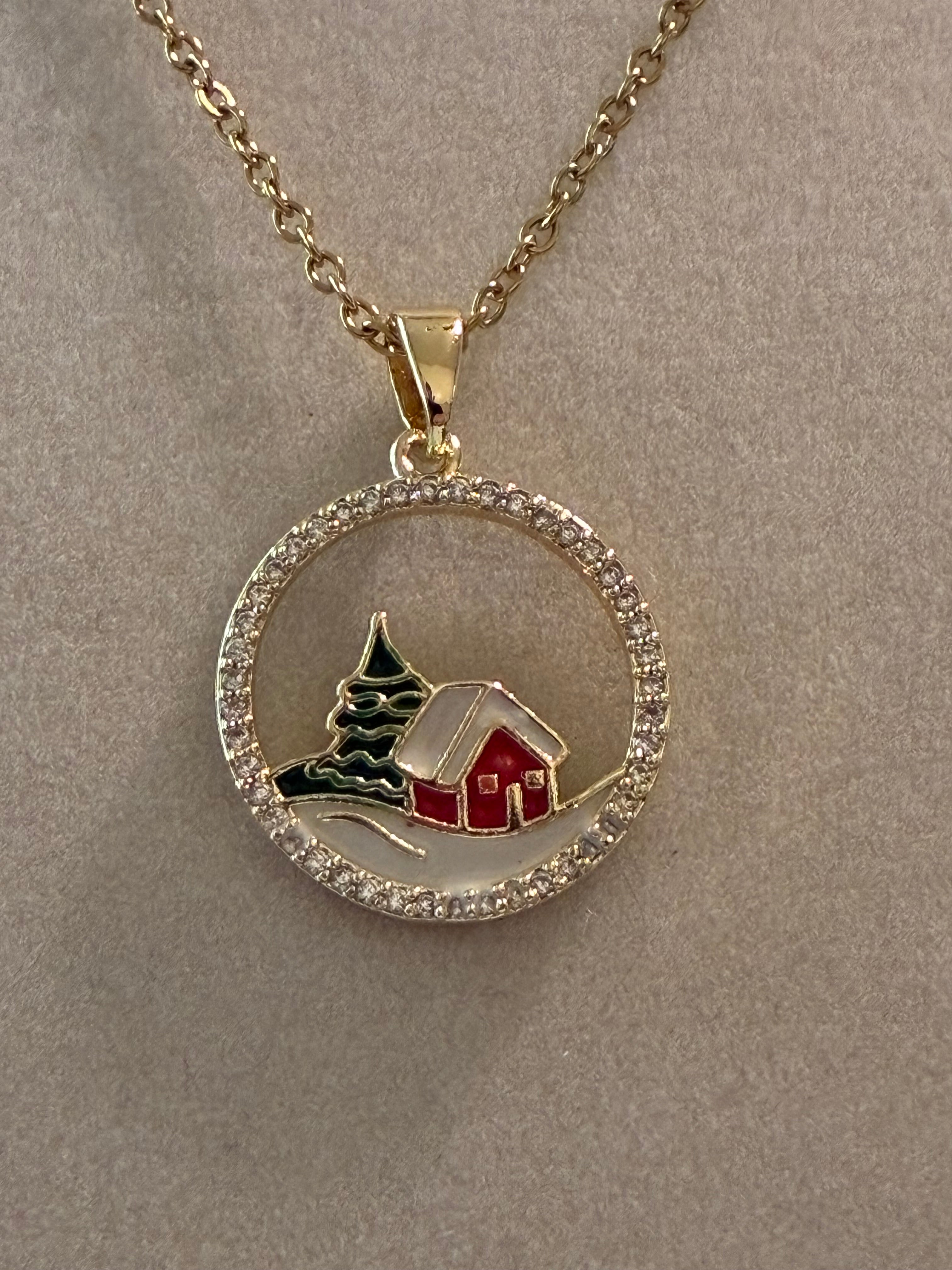 Stainless steel, gold plated winter scene with rhinestones