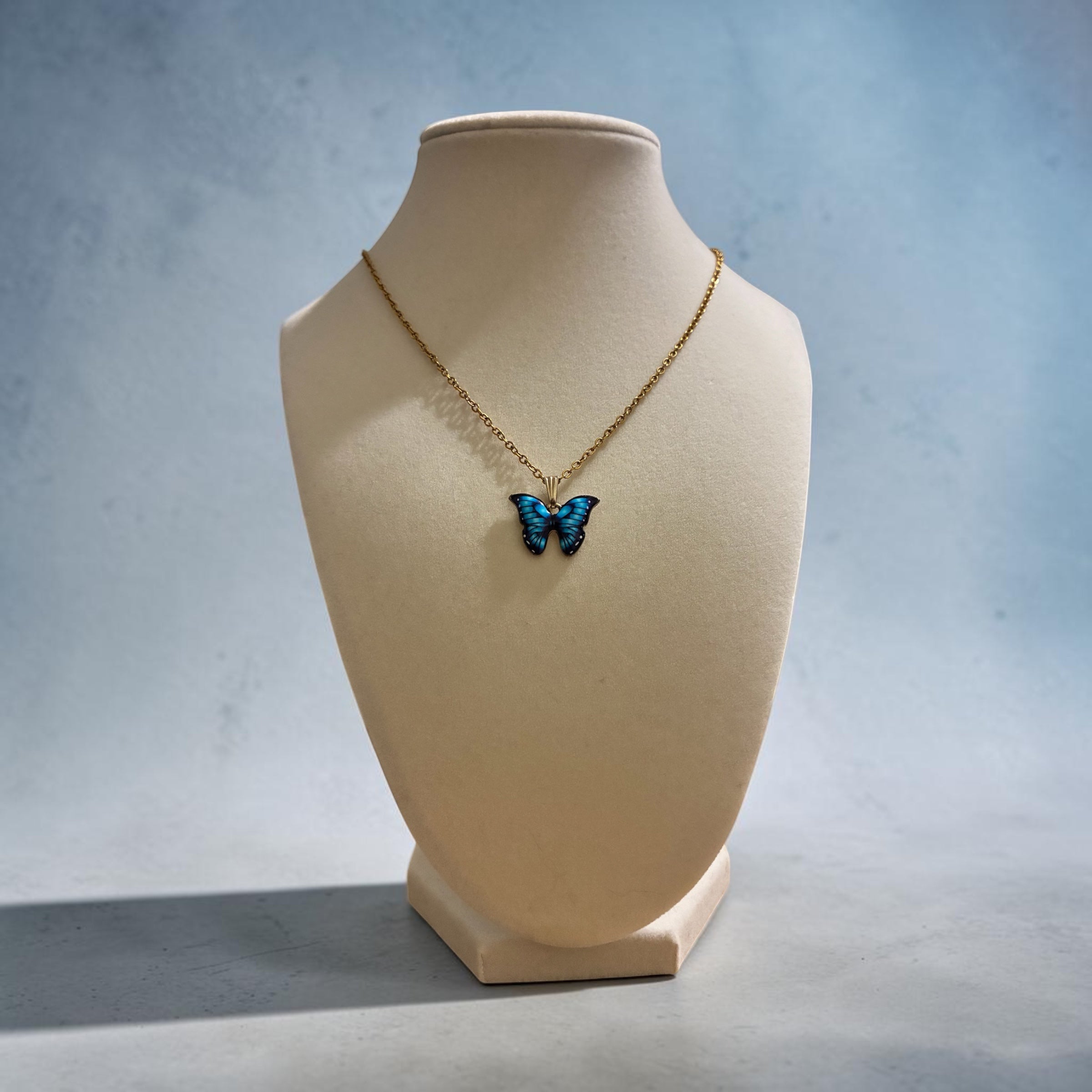 Gold plated blue butterfly
