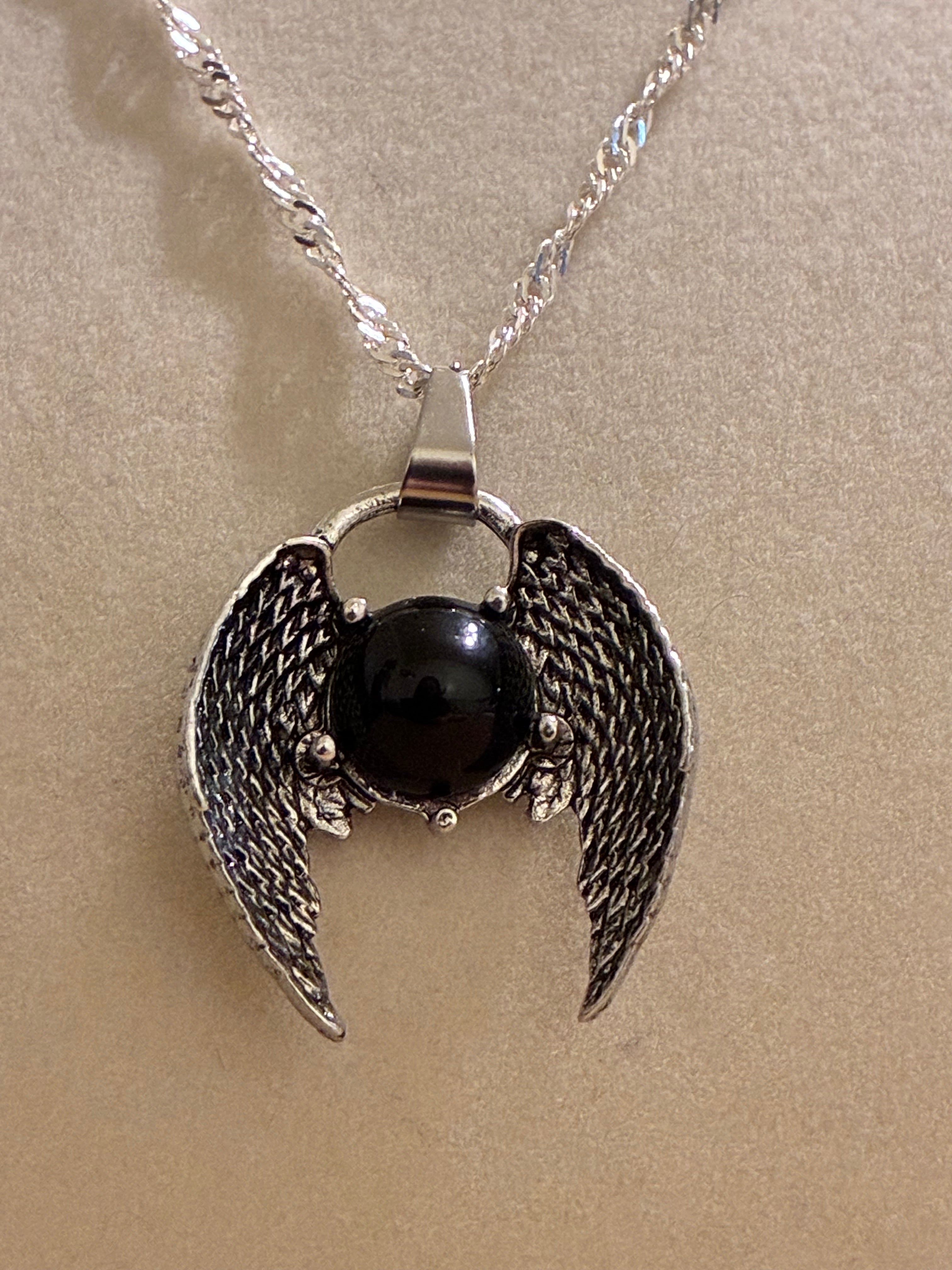 Silver plated black stone wings