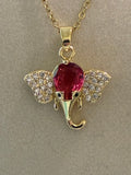 Stainless steel gold plated￼elephant with pink stone and rhinestones ￼