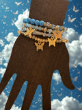 Set of 4 blue and gold beaded butterfly bracelets