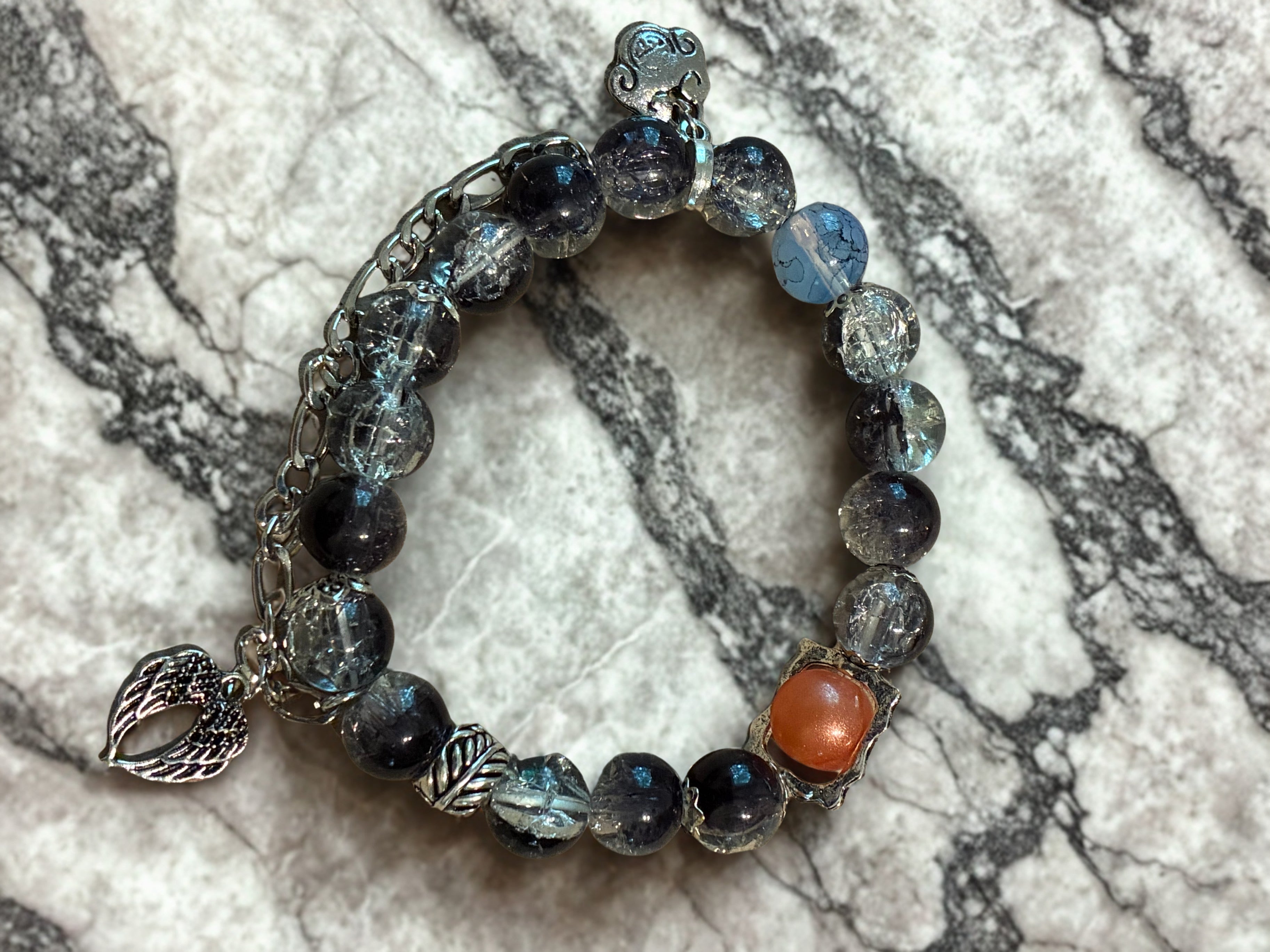 Dark galaxy bracelet with charms