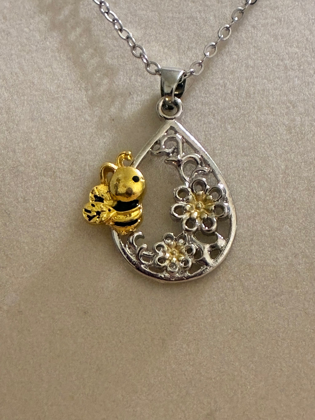 Silver plated bee with flowers
