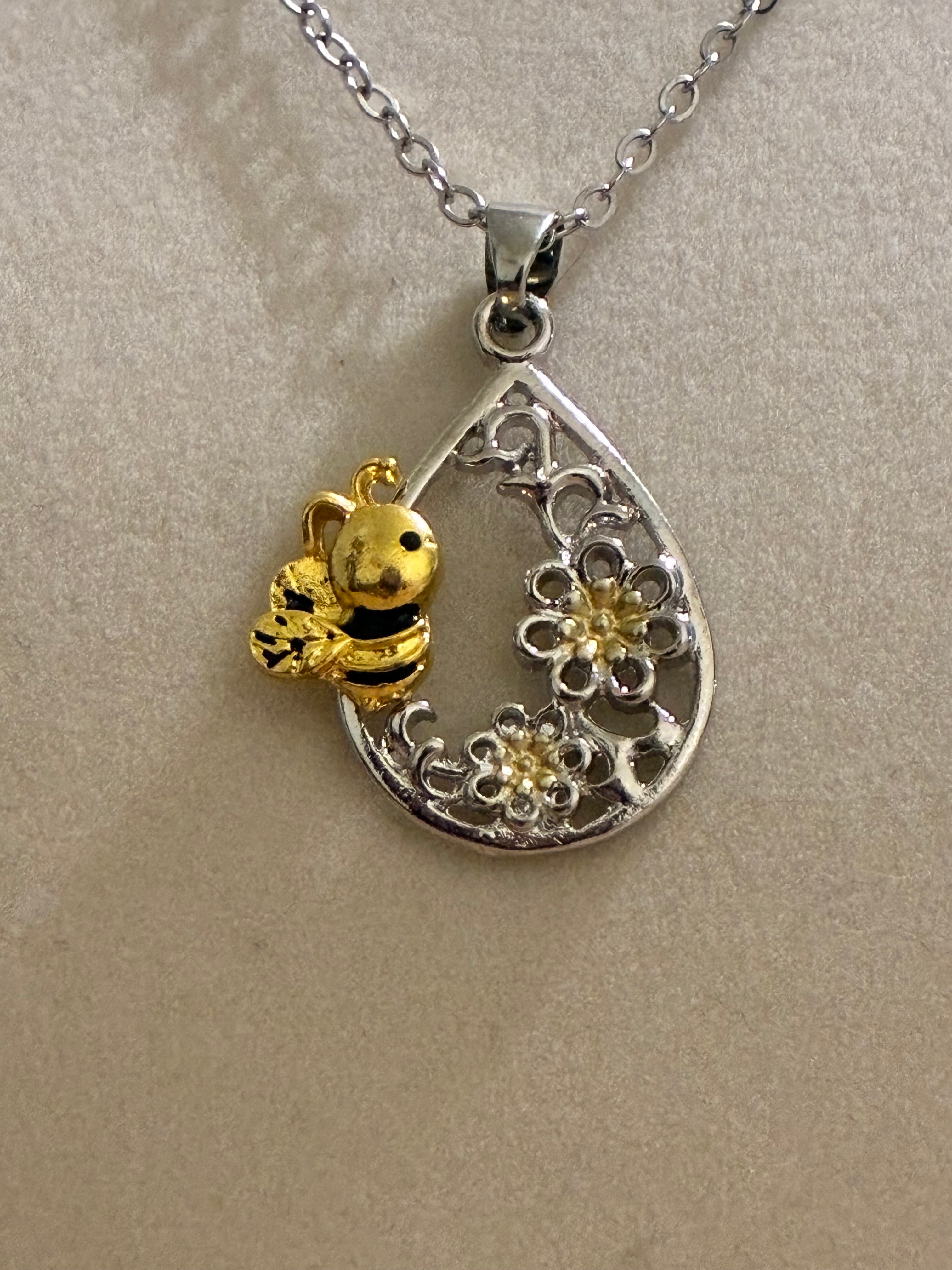 Silver plated bee with flowers