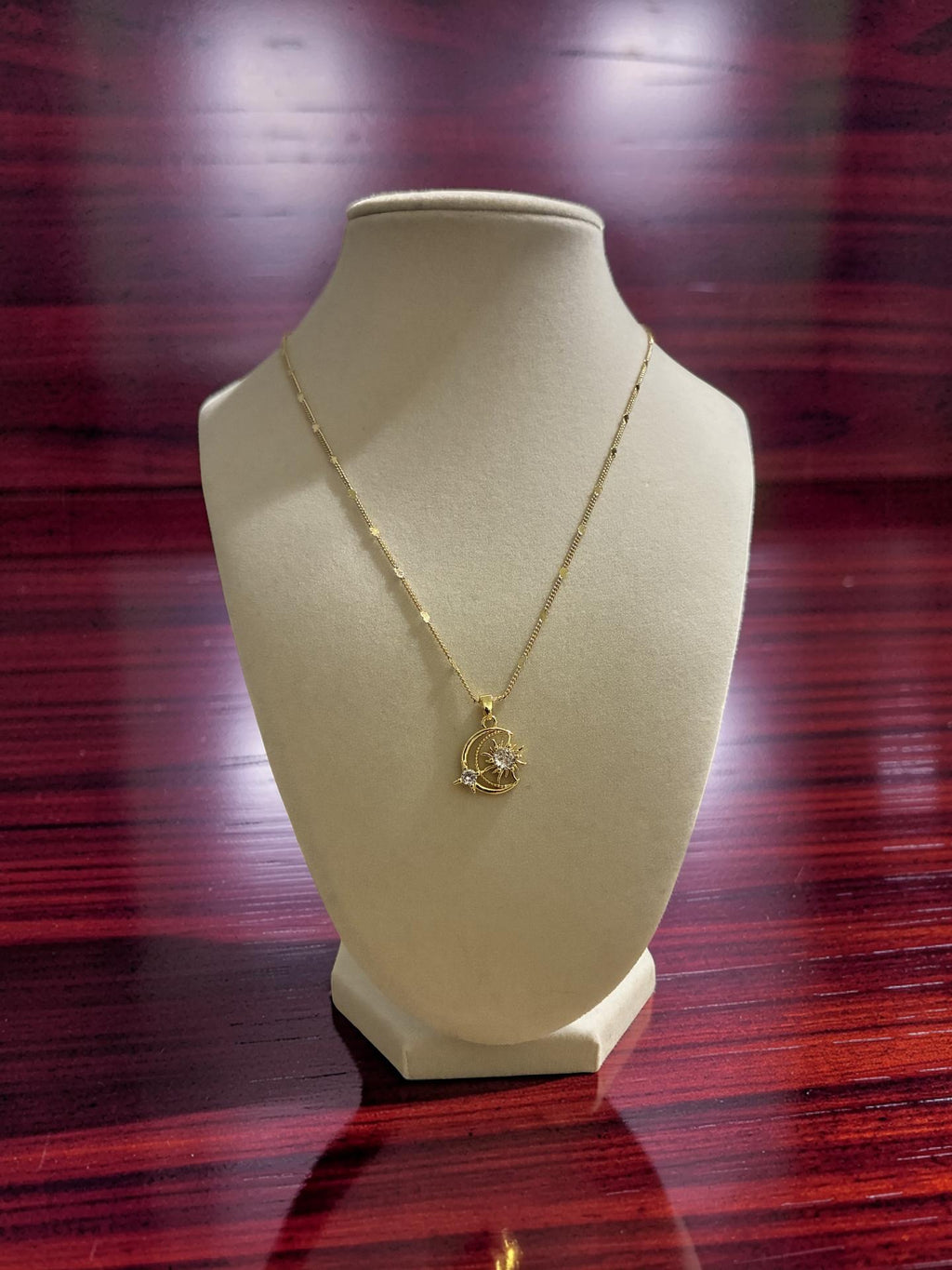 Gold plated moon and stars with rhinestones, heart chain