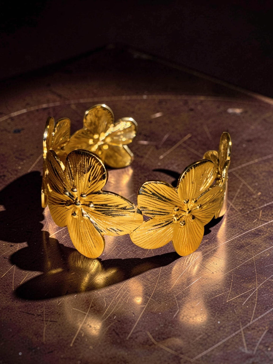 Gold plated cuff with flowers