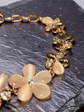 Gold plated, pink flowers with rhinestones