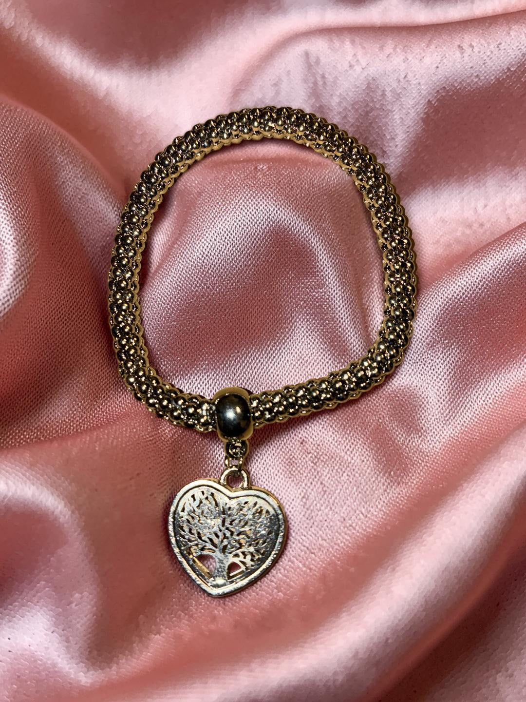 Silver plated tree of life heart