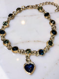 Silver plated heart, blue and green rhinestones ￼