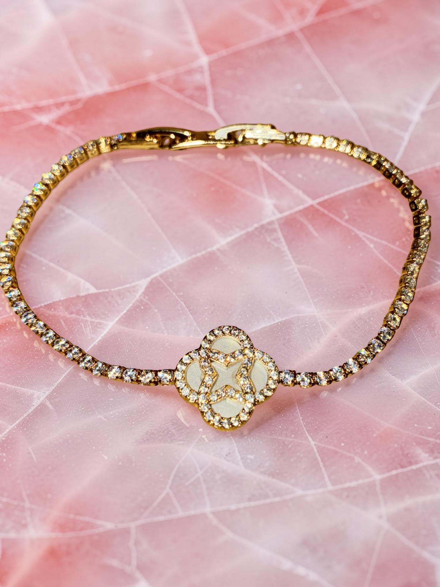 Gold plated, opal flower with rhinestones