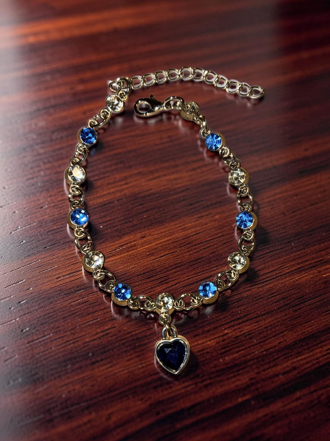 Silver plated heart, blue and white rhinestones ￼