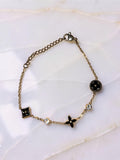 Gold plated, flowers, and rhinestones, dainty