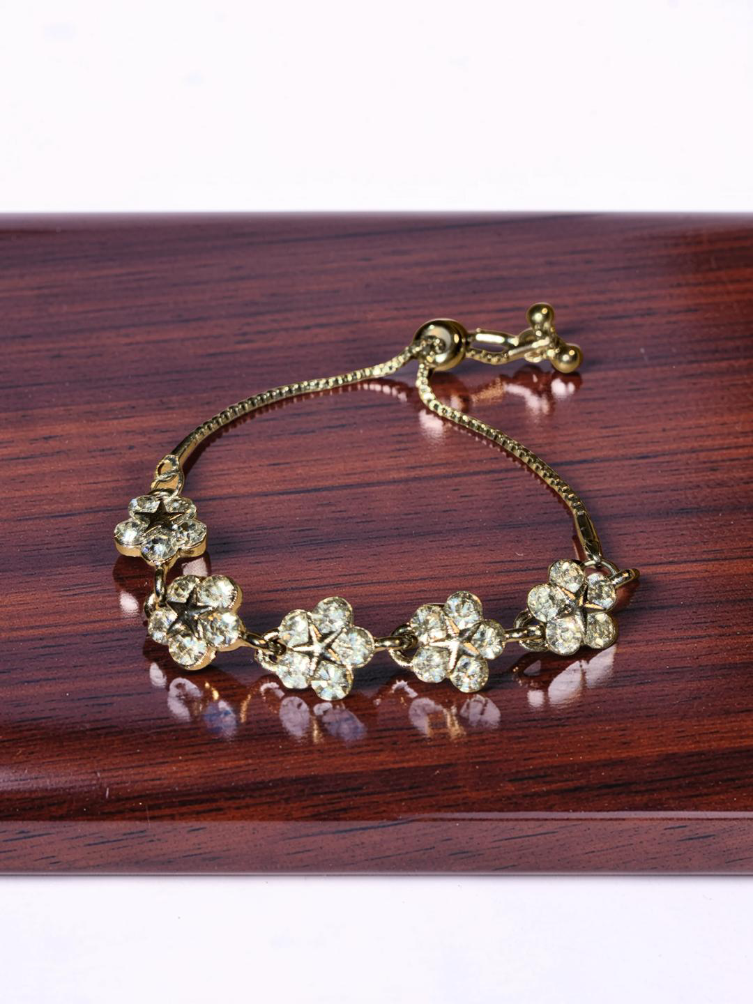 Silver plated flowers with stars and rhinestones