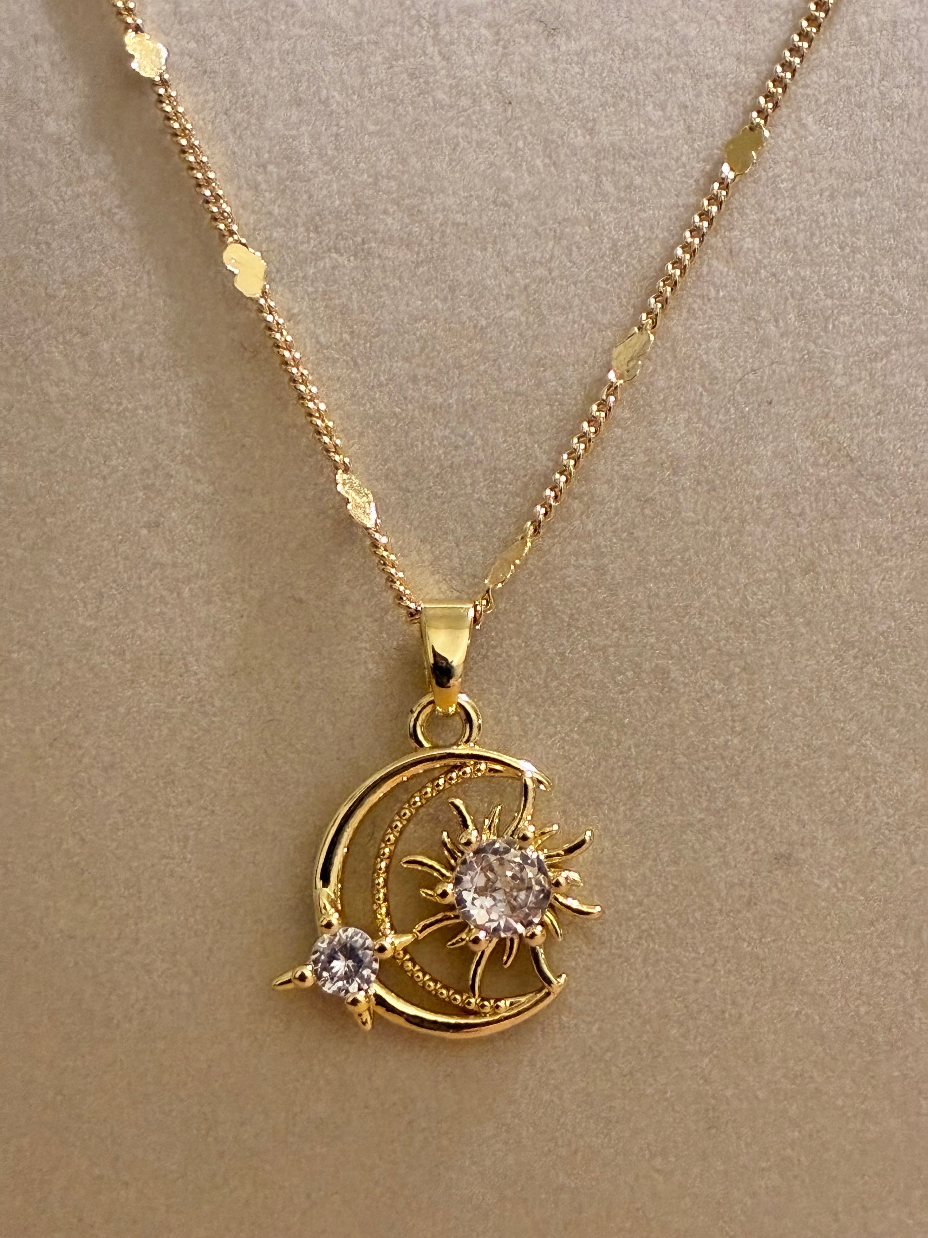 Gold plated moon and stars with rhinestones, heart chain
