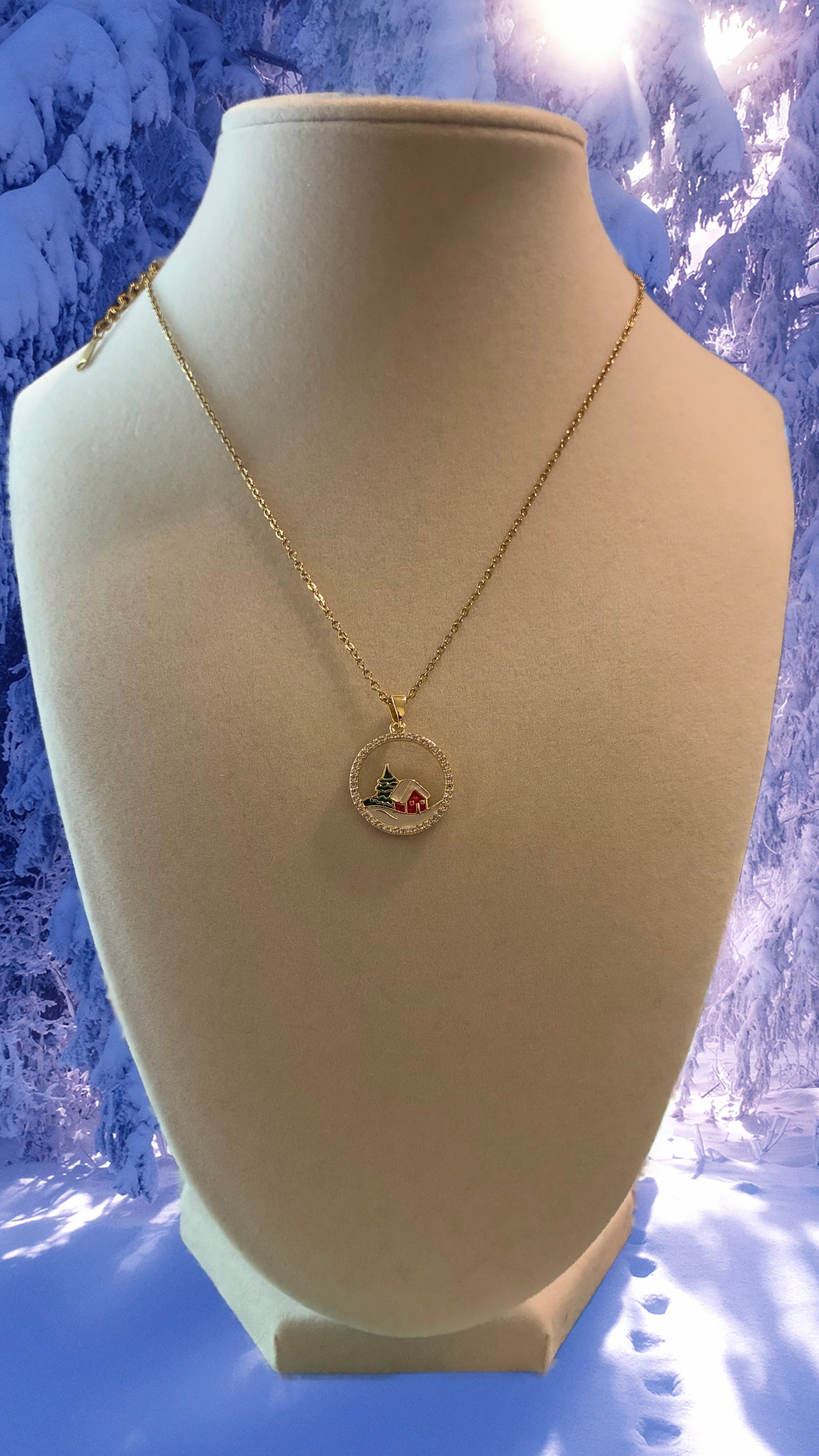 Stainless steel, gold plated winter scene with rhinestones