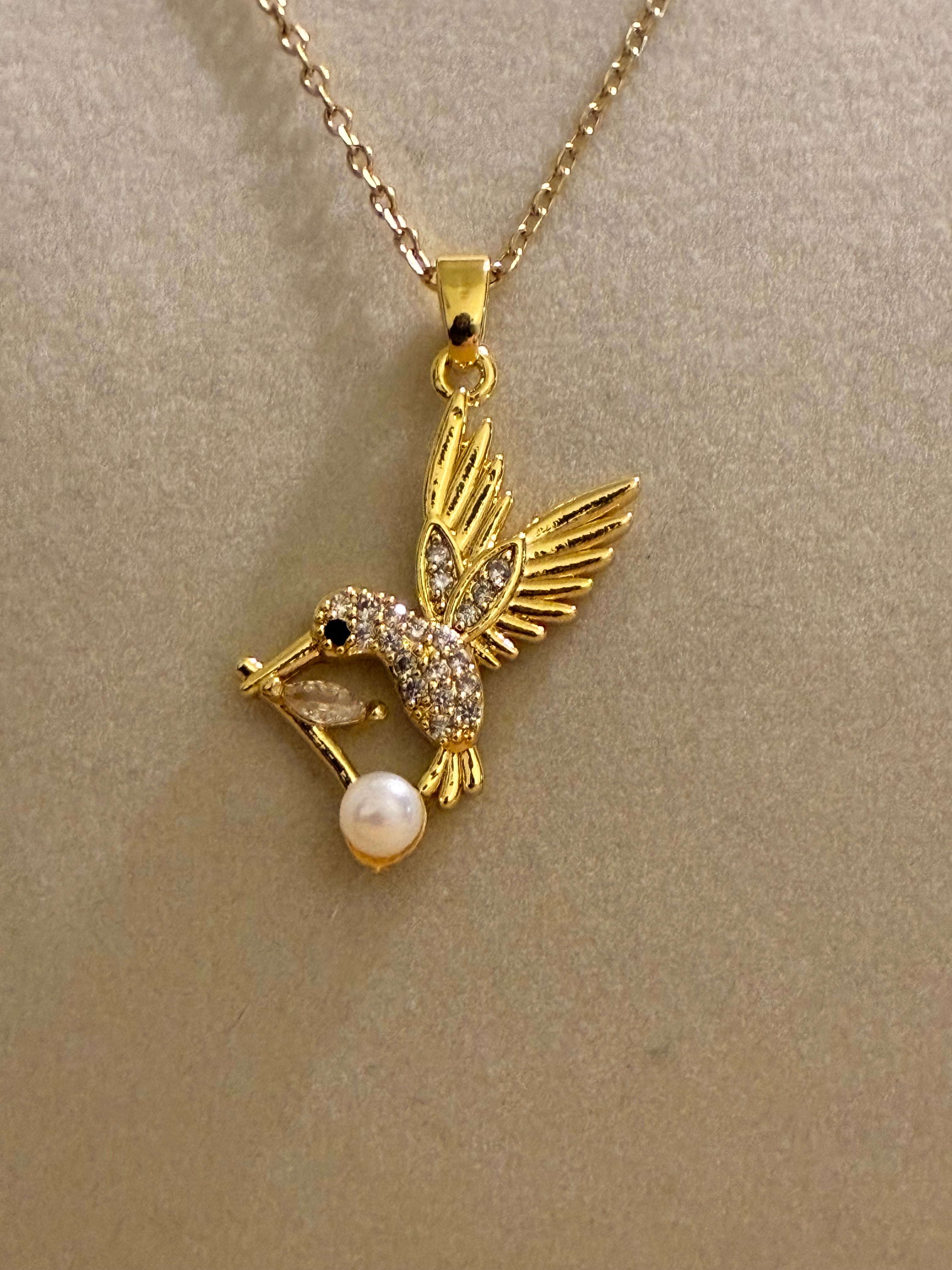 Stainless steel gold plated hummingbird with rhinestones and pearl
