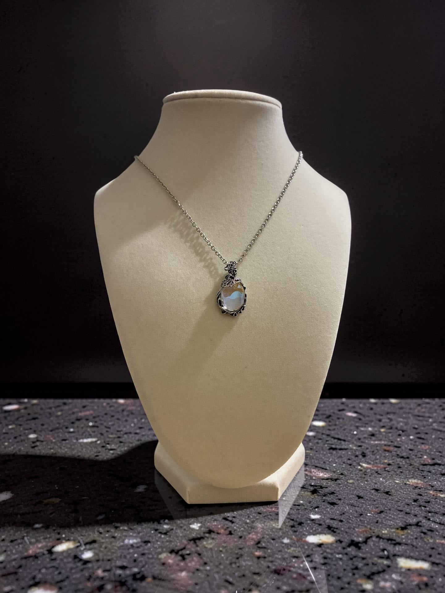 Silver plated vine leaf wrapped moonstone