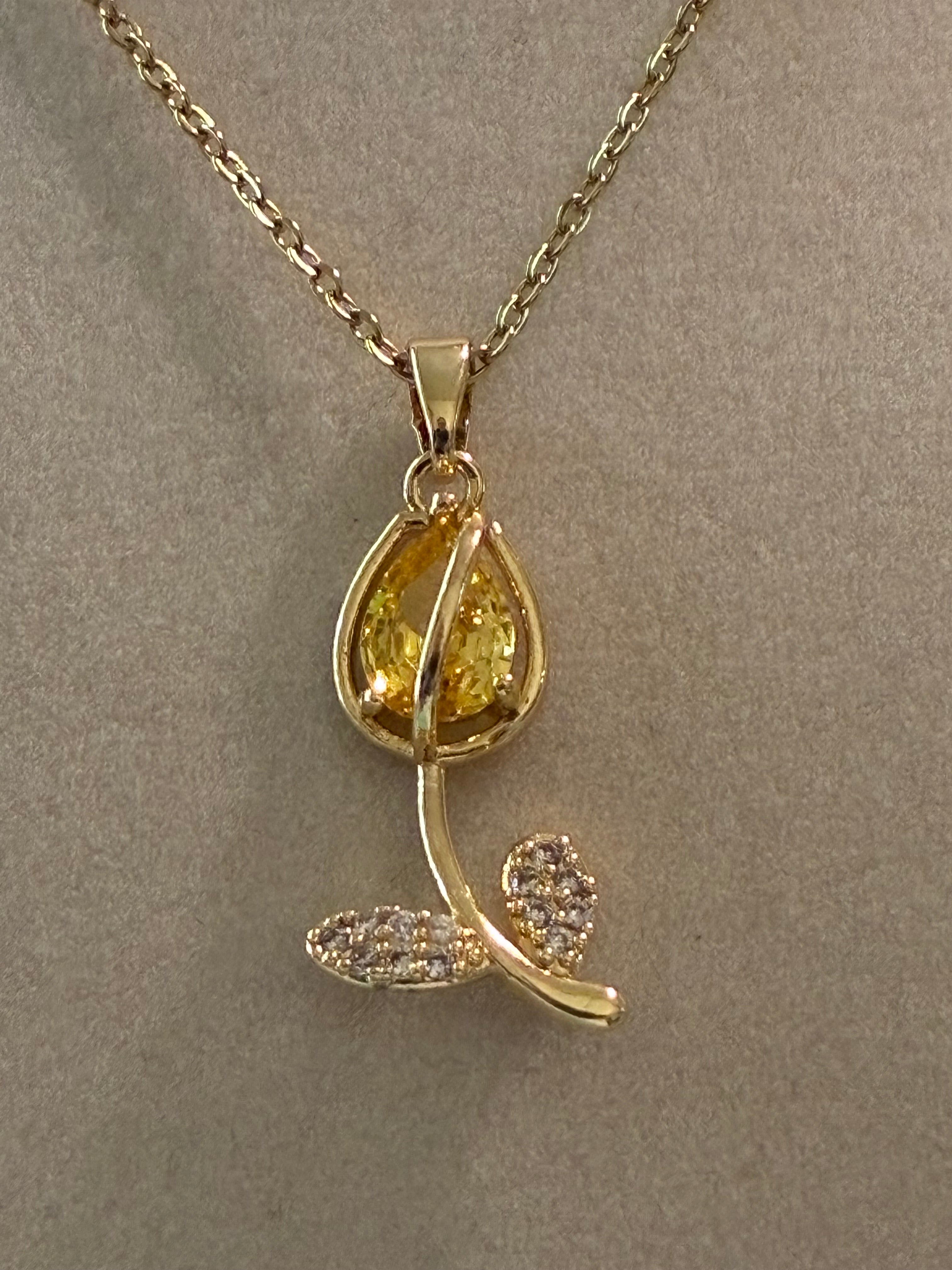 Stainless steel, gold plated, Yellowstone, tulip with rhinestones ￼