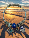 Handmade evil eye and hand charm bracelet